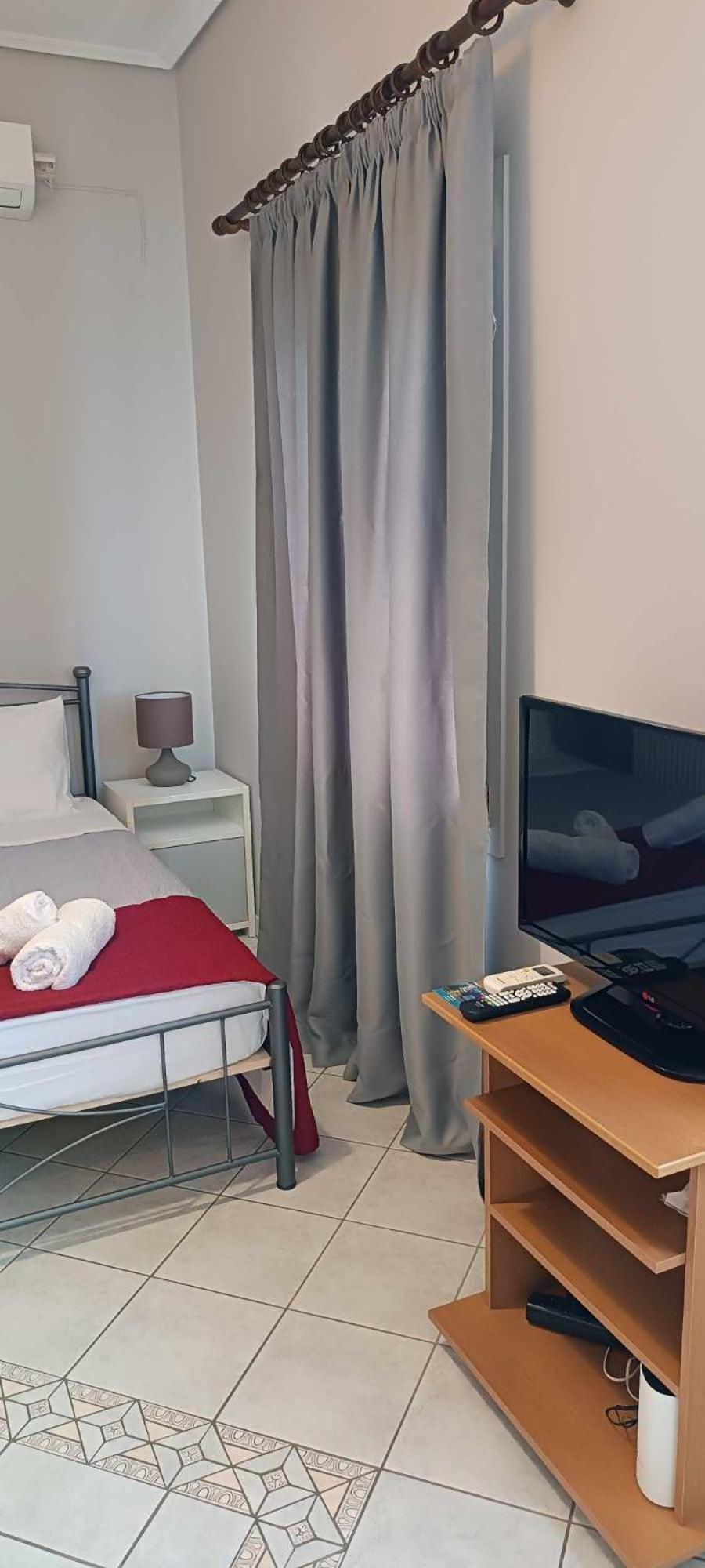 Andros Guesthouses Habitación foto