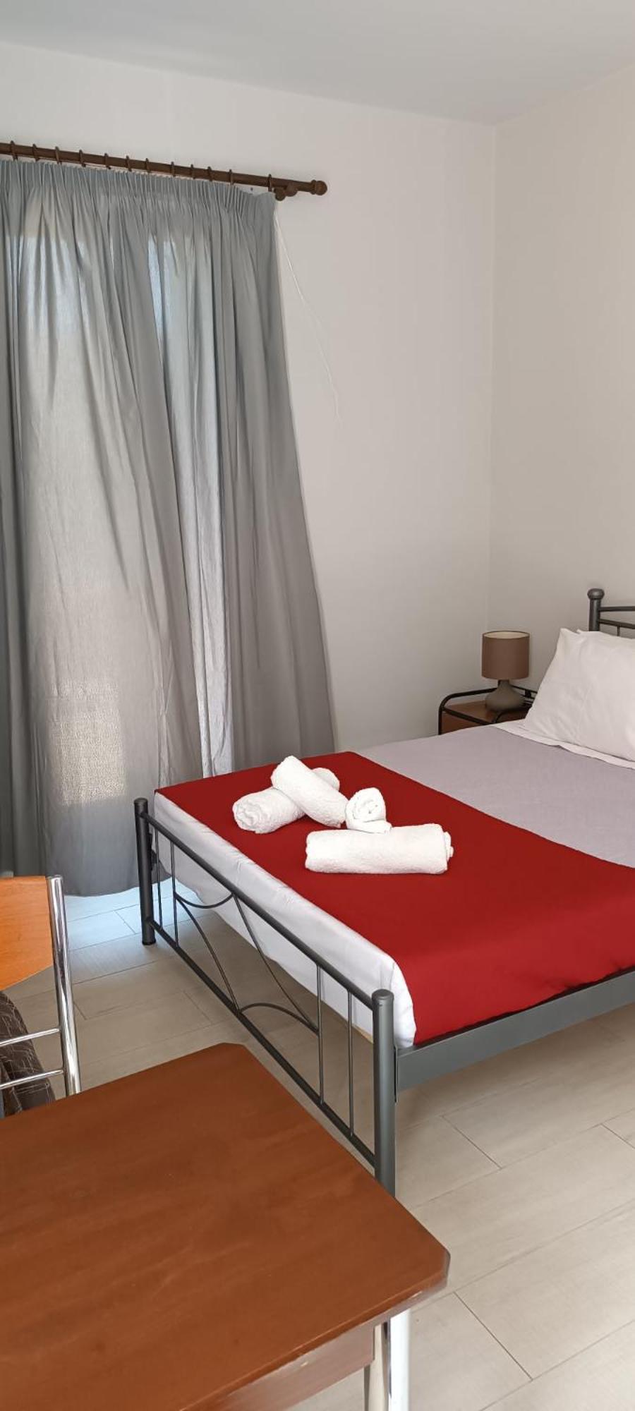 Andros Guesthouses Habitación foto
