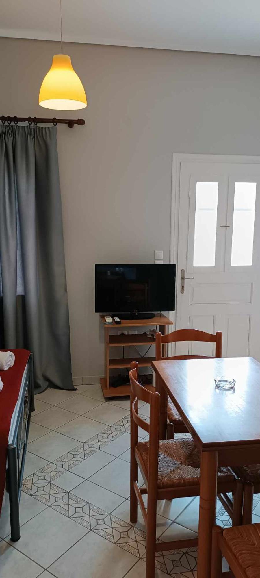 Andros Guesthouses Habitación foto